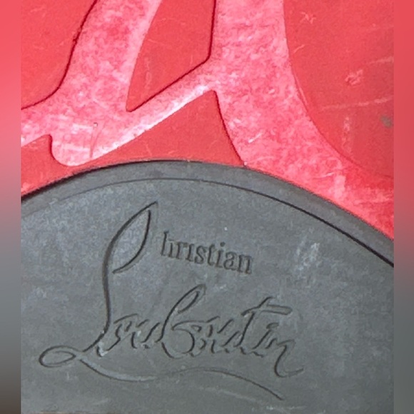 CHRISTIAN LOUBOUTIN
Louis Junior Spikes Leather Sneakers